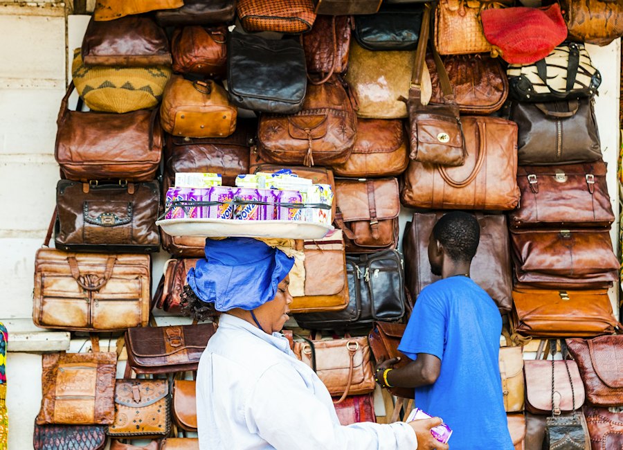 Traders at a leather bag stall in a Ghanaian market
